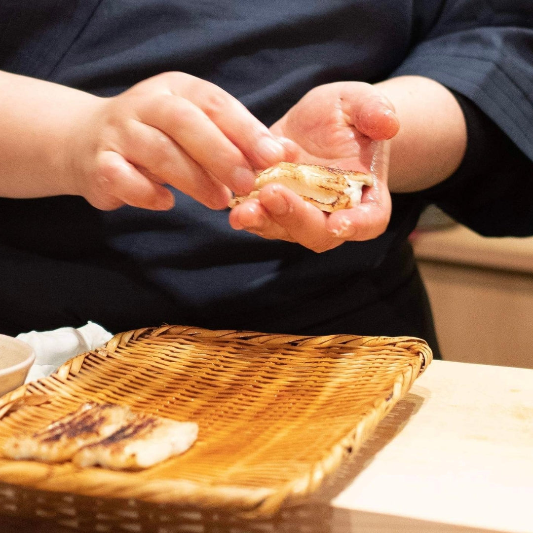 Sushi-making class taught by a professional master sushi chef and  sake-tasting tour